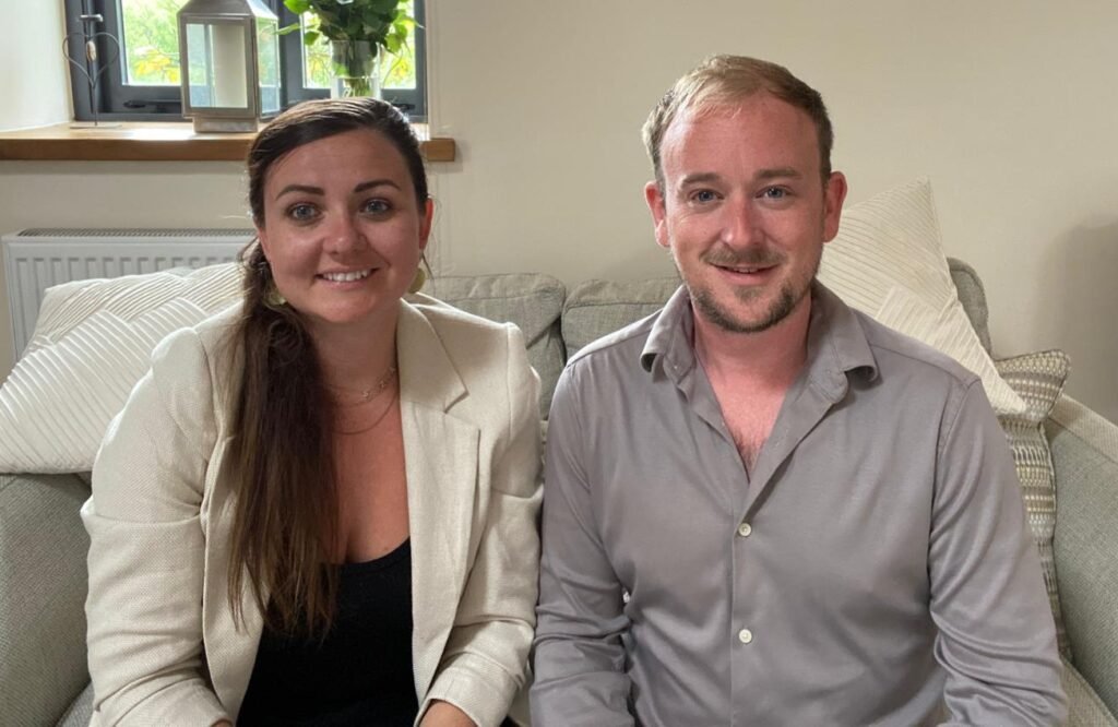 A photo of David and Jacqui, both counsellors in Taunton, sitting together